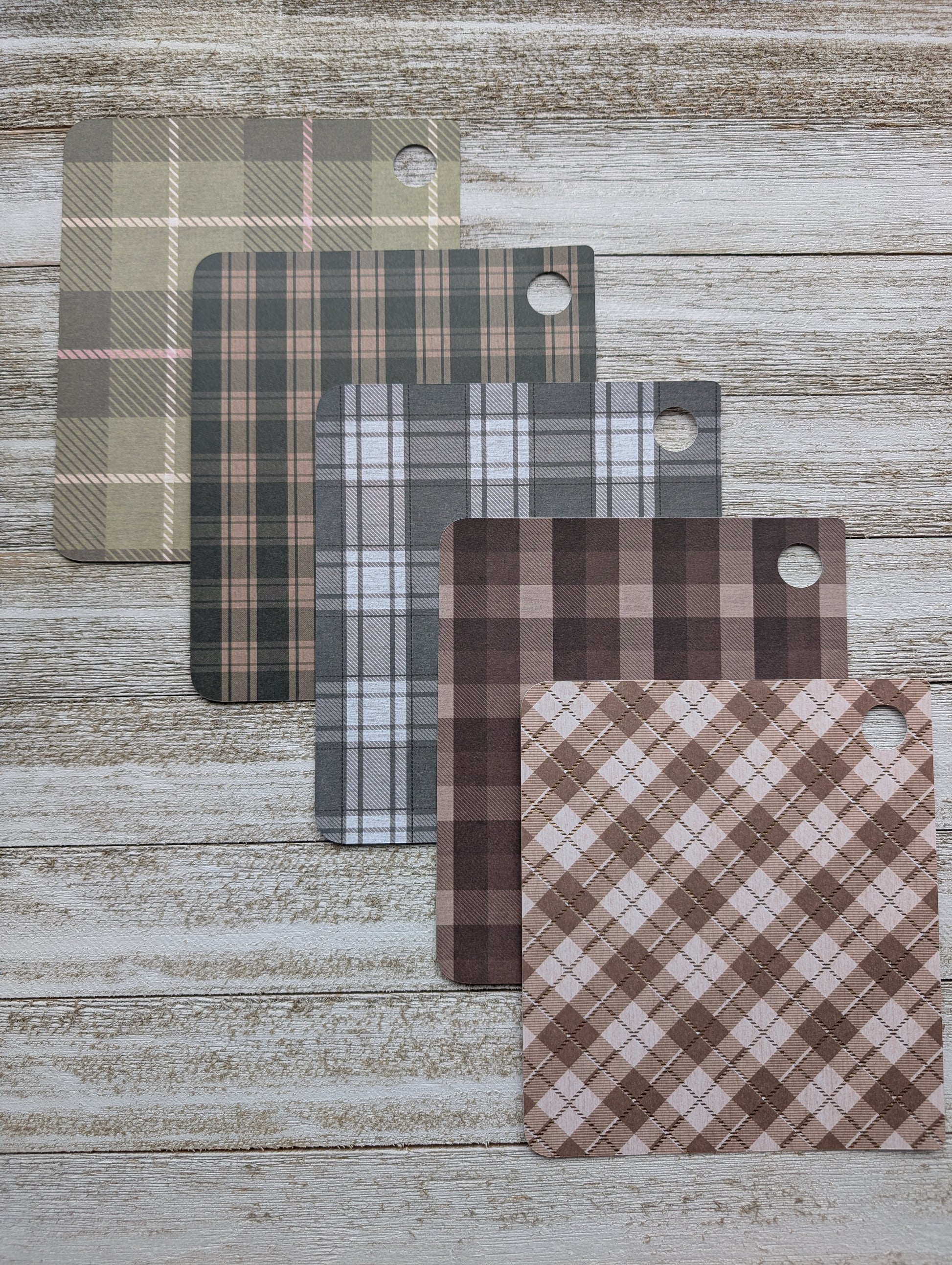 Five plaid Kobo Libra Color inserts for clear case.