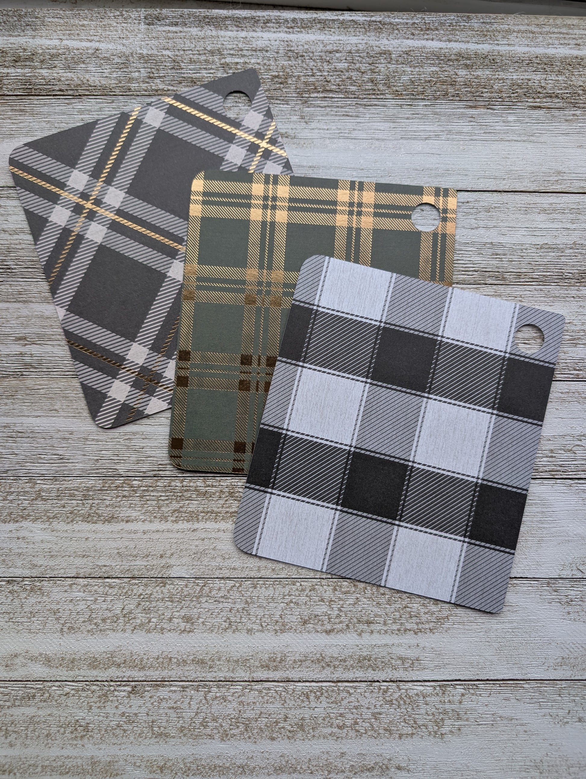 Three plaid Kobo Libra Color inserts for clear case.